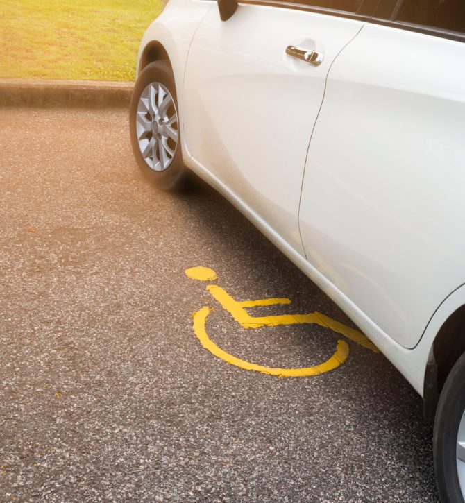 A car parked in an accessible space