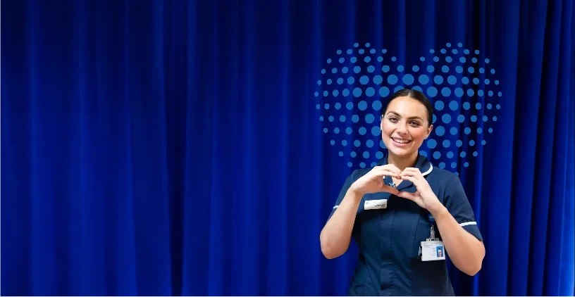 nurse making heart symbol with hands