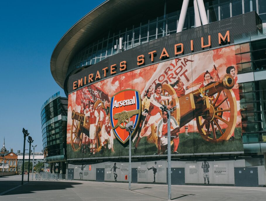 The Emirates Stadium, one of the entrances, featuring the Arsenal crest and mural