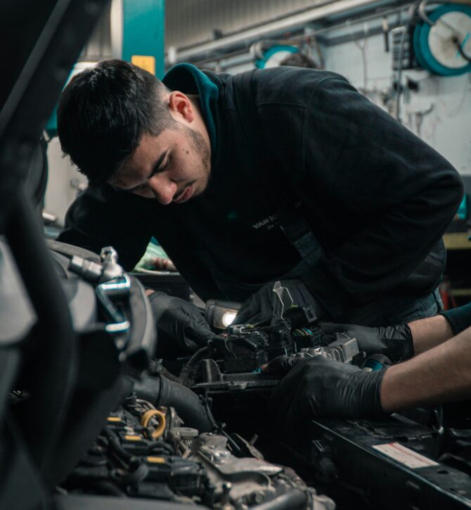 Mechanic inspecting an engine