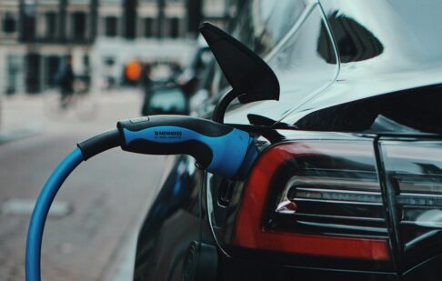 An electric car plugged in the charge